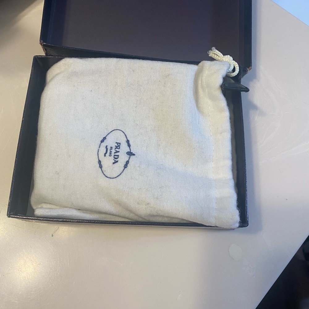 Prada wallet almost new dust bag and original box